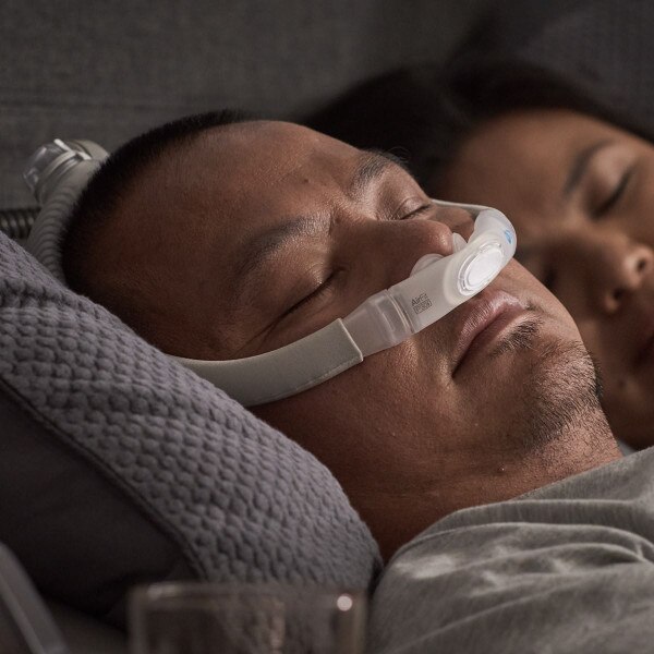 Man wearing ResMed AirFit P30i